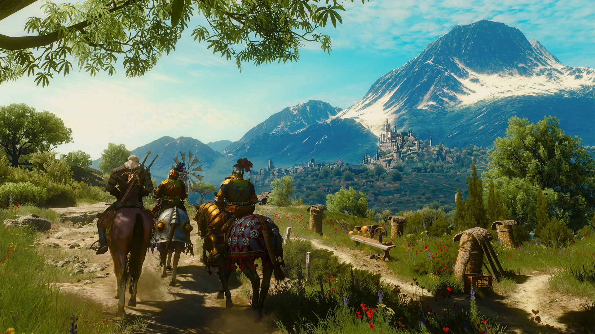 Geralt on Roach riding a sunlit dirt road beside two armoured Toussaint knights, the castle of Beauclair below snow-capped mountains ahead