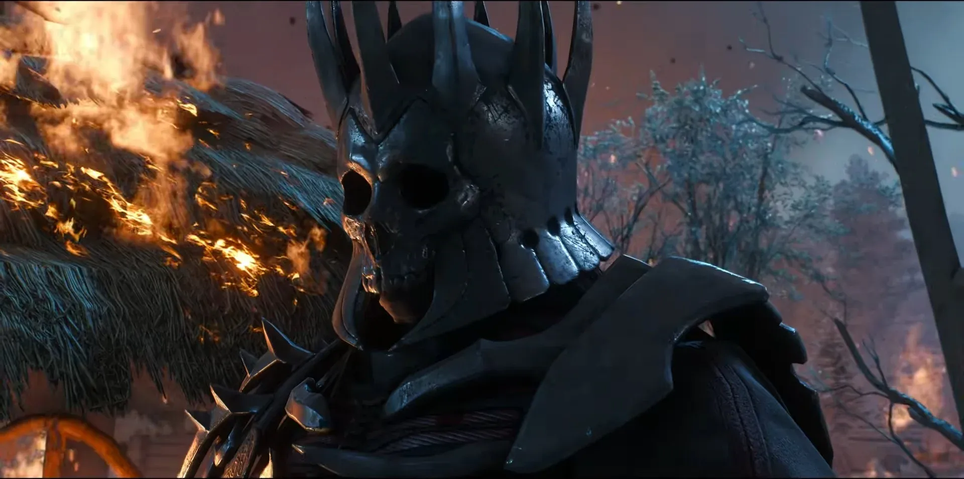 Eredin, king of the Wild Hunt, in his spiked skull-faced helmet with a thatched roof burning behind him