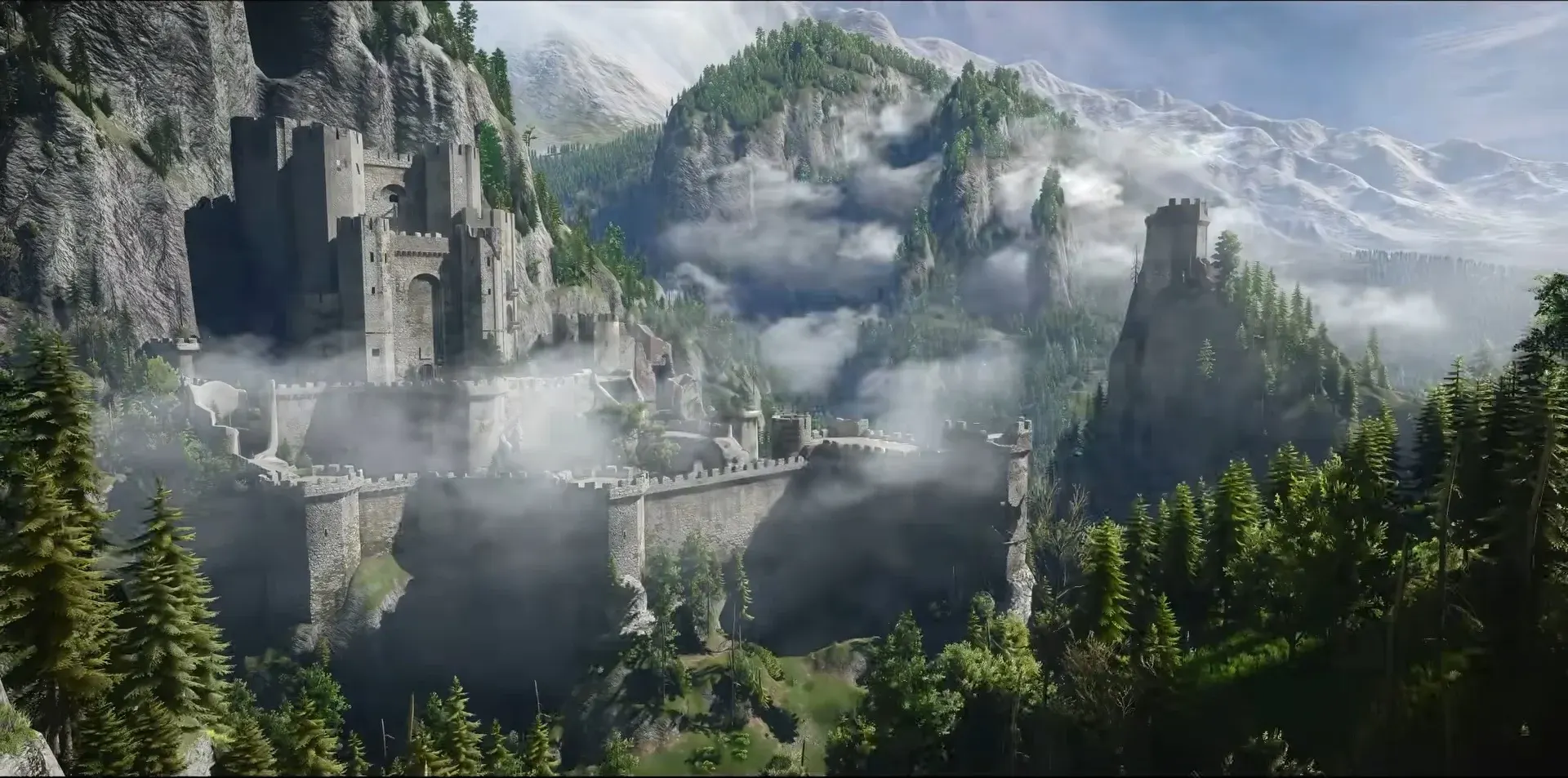 The witchers' keep of Kaer Morhen on a cliffside, its walls wrapped in low cloud among pine forests and snowy peaks